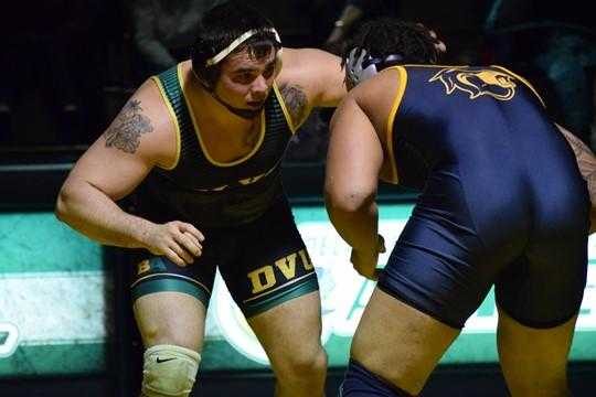 Featured in the image above is Zach Roseberry who pinned his opponent on Senior Night at Delaware University. 