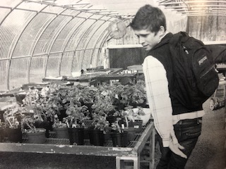 A student in the BDHS greenhouse. This picture was featured in the 2008 yearbook.
