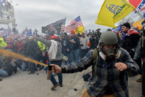 Trump supporters clash with police and security forces as people try to storm the US Capitol Building in Washington, DC, on January 6, 2021.