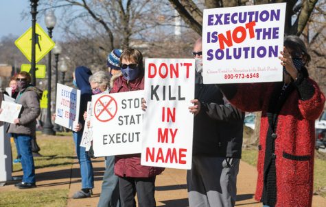  People gathered on Tuesday Jan. 12, 2021 protesting the death penalty and the impending executions of federal inmates; Lisa Montgomery, Corey Johnson and Dustin Higgs. 